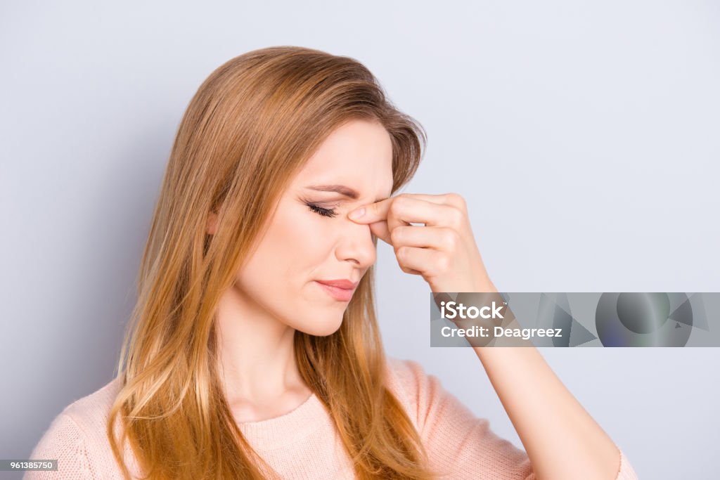 People disease person emotion expression hurt concept. Side half-faced portrait of charming pretty gorgeous thoughtful minded lady suffering from ache isolated on gray background copy-space Sinusitis Stock Photo