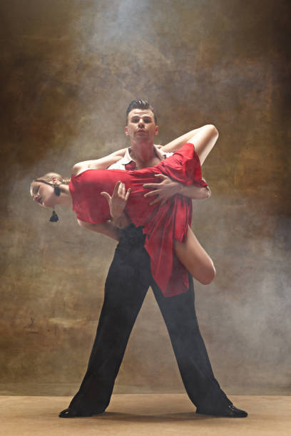 istock Flexible young modern dance couple posing in studio 961390216