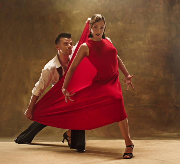 istock Flexible young modern dance couple posing in studio 961390534