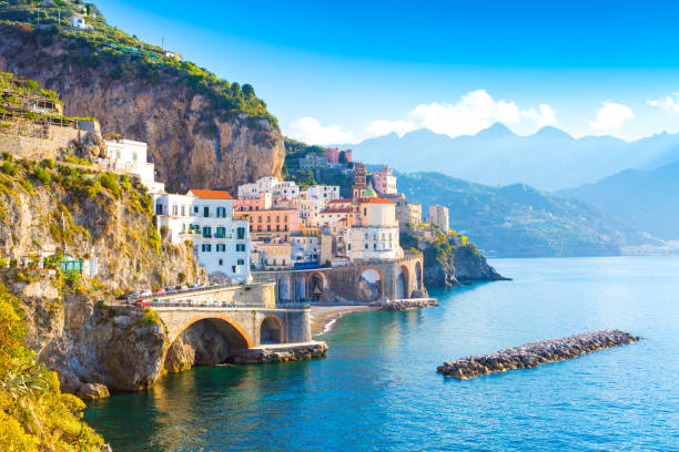Morning view of Amalfi cityscape, Italy Morning view of Amalfi cityscape on coast line of mediterranean sea, Italy sorrento italy photos stock pictures, royalty-free photos & images
