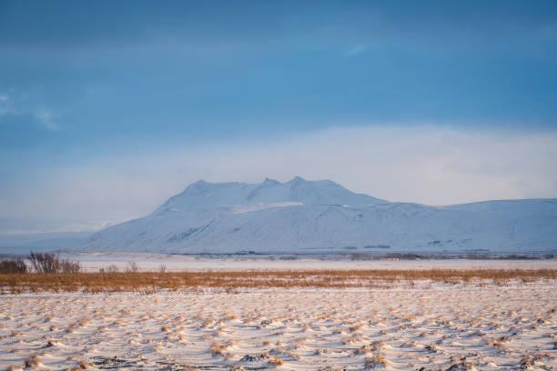 istock Dramatic icelandic landscape with snow covered mountains. 961393966