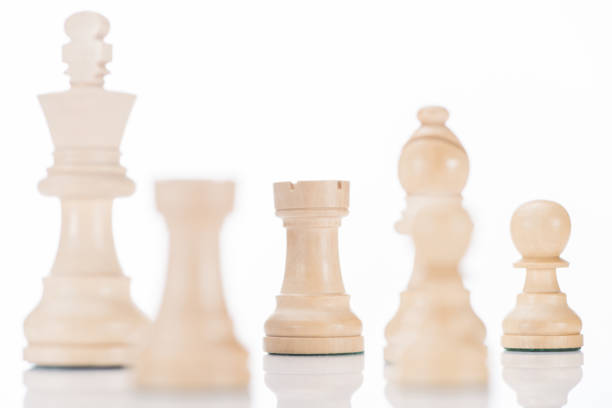 istock white chess king, rooks, bishop and pawns on white 961395876