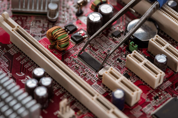 istock Mainboard close-up view with electronic details and components 961405028
