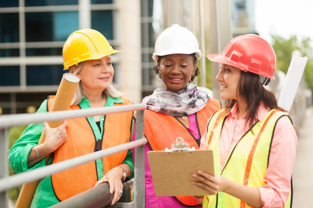 istock STEM Female engineer or architect team working on a construction project in city. 961412878
