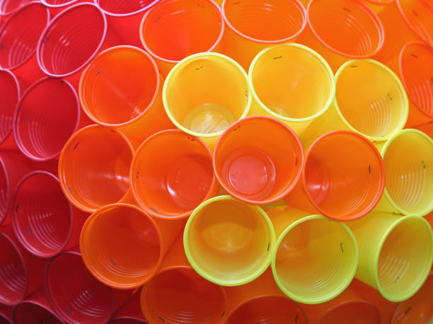 orange red and yellow plastic cups at a party