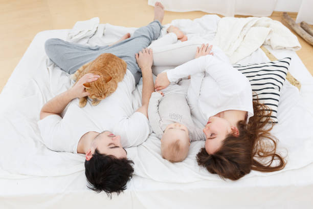 istock Young parents have fun with their baby 961413826