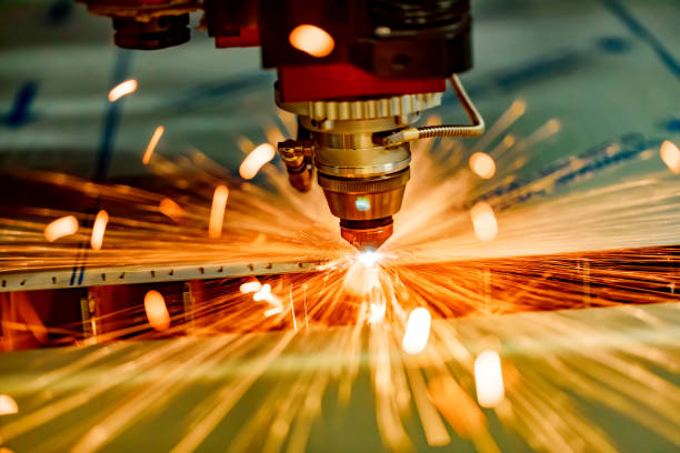 istock CNC Laser cutting of metal, modern industrial technology. 961415372
