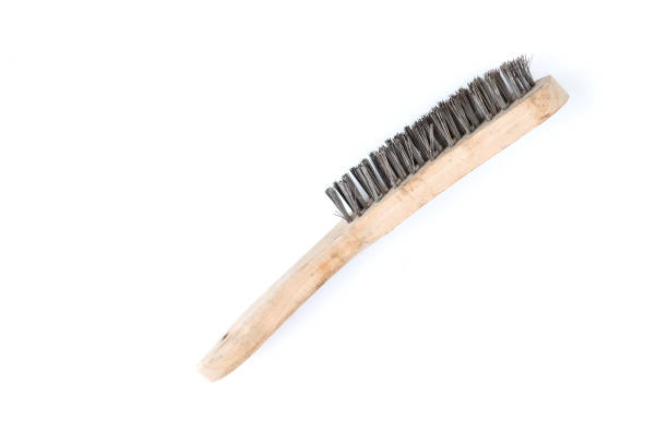 istock Wooden wire brush isolated on a white background. Strong brush for rust removal. Industrial wire brush. 961420882