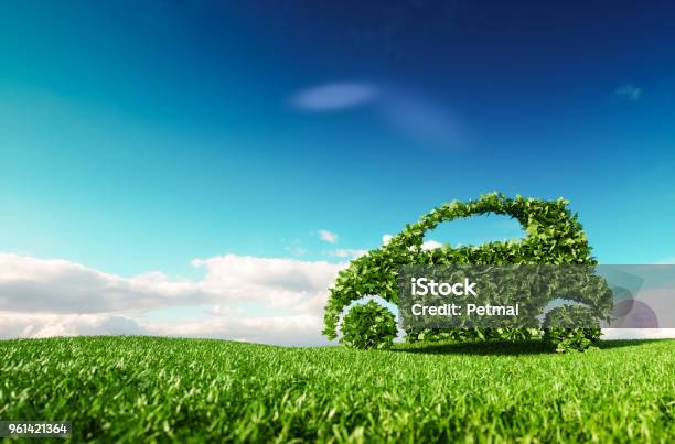 Eco Friendly Car Development Clear Ecology Driving No Pollution And Emmission Transportation Concept 3d Rendering Of Green Car Icon On Fresh Spring Meadow With Blue Sky In Background Stock Photo - Download Image Now