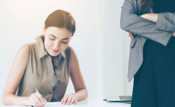 istock Young employee and manager in meeting at office. 961428160