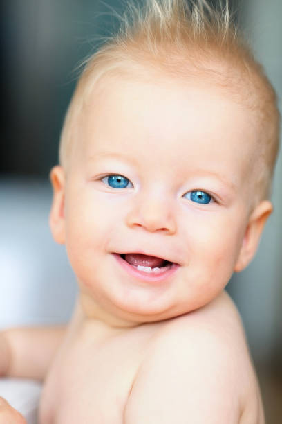 istock Baby boy with blue eyes 961434776