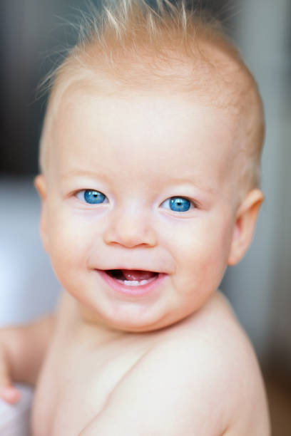 istock Baby boy with blue eyes 961434806