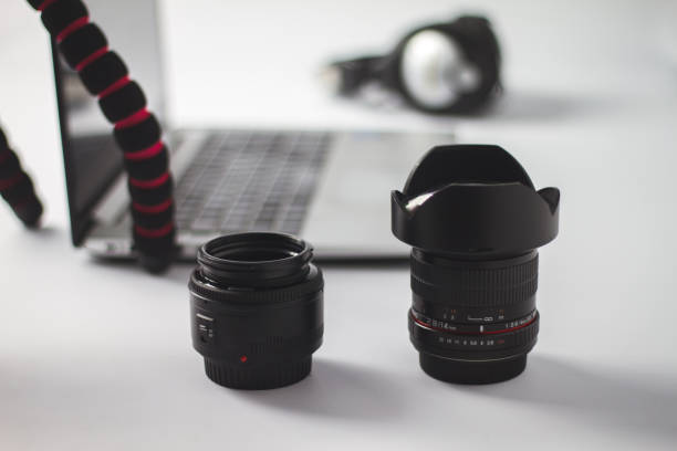 istock organization of photographic material and editing with computer on work table 961440744