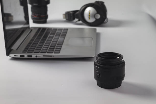 istock organization of photographic material and editing with computer on work table 961440960