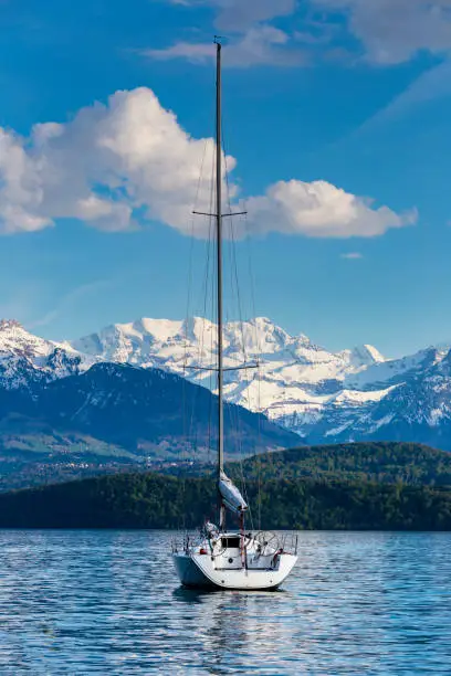 Sailing boats in port at lake Thun ( Thunersee )  infornt of Alps mountain in spring season