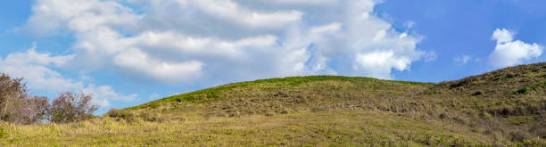 istock Panorama view of green mountain with blue sky and white cloud 961442342