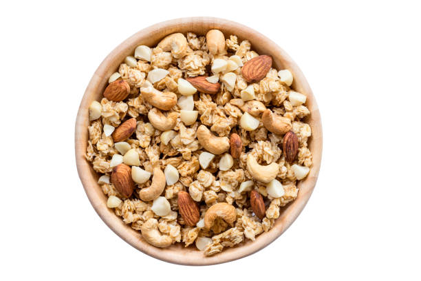 istock Close up top view granola in the bowl on isolated with clipping path. 961442472