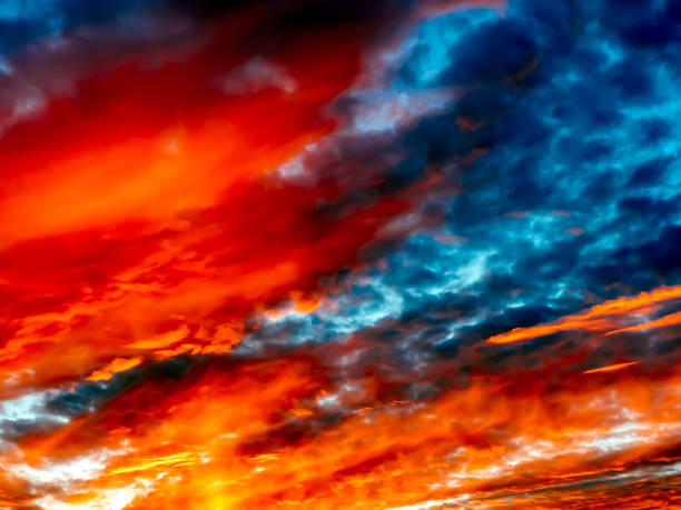 istock Beautiful Vibrant Sunset Sky. Dramatic bright sunset clouds. Colorful sky with clouds background 961443356