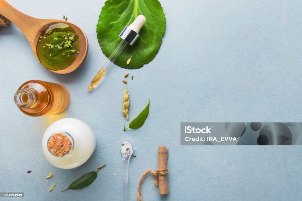 Natural cosmetics, oils for skin care on a light background. Homeopathic oils, whey, milk, soap. Beauty blogger concept. Natural cosmetics and oils for skin care on a light background. Homeopathic oils, whey, milk, soap. Beauty blogger concept Skin Care Stock Photo