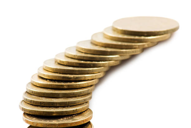 istock image of coins on a white background 961447122