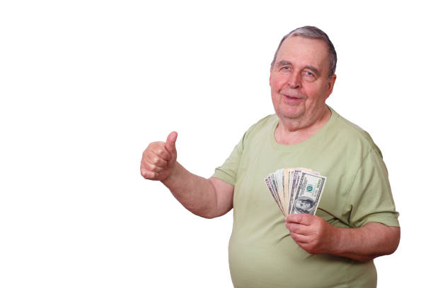 istock Portrait of senior elderly satisfied man with stack of dollars a 961448406