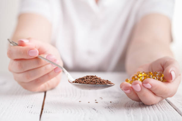 istock Flax seed or oil in capcules as vitamin E 961452238