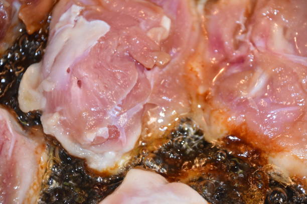 istock Frying the chicken in a pan 961458602