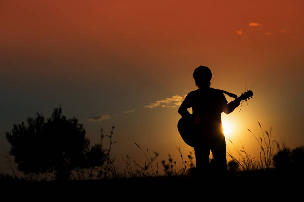 istock Silhouette of a Musician 961467226