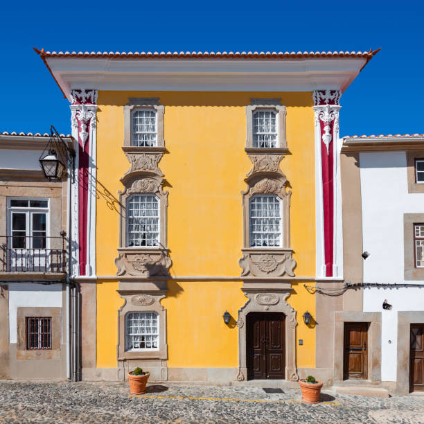 facade of the magessi house, also known as yellow house - castelo de vide imagens e fotografias de stock