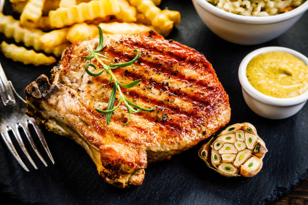 istock Grilled pork chop and vegetables 961483488