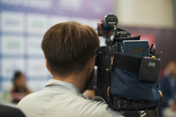 istock The young male cameraman doing the filming 961490328