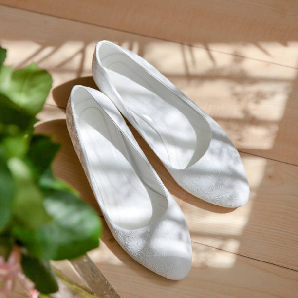 istock white shoes on the floor 961494064