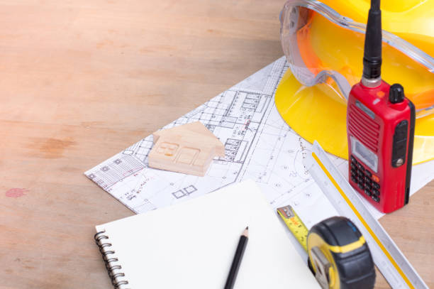 istock Safety Equipment technician on wood table 961495120