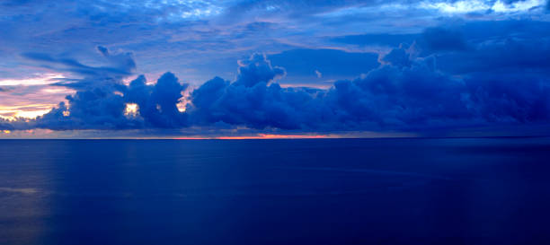 istock Thunderstorm Over the Atlantic Ocean at Sunrise 961495758