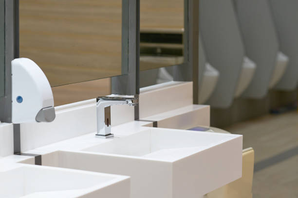 istock Toilet sink for wash hand with soap drop on blur urinal background 961500816