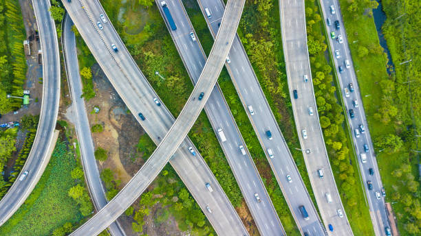 istock Aerial view of Traffic trails on highway intersection 961508042