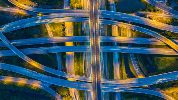 istock Aerial view of Traffic trails on highway intersection 961508044