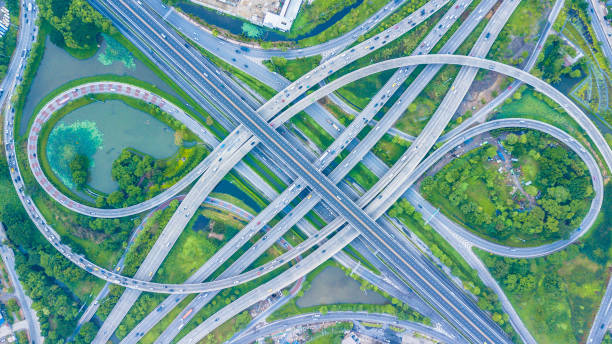 istock Aerial view of Traffic trails on highway intersection 961508130