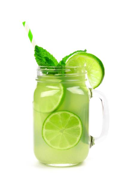 istock Limeade and mint in a mason jar glass isolated on white 961510820