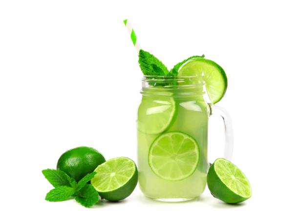 Limeade in a mason jar glass isolated on white