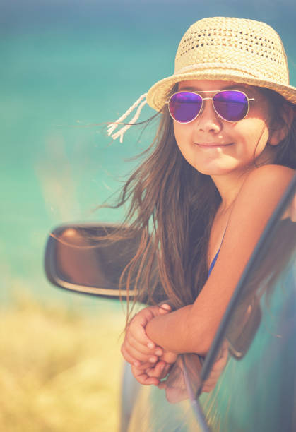 istock Young Family Arriving On The Beach 961511982