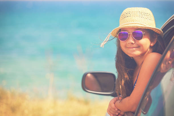 istock Young Family Arriving On The Beach 961512164