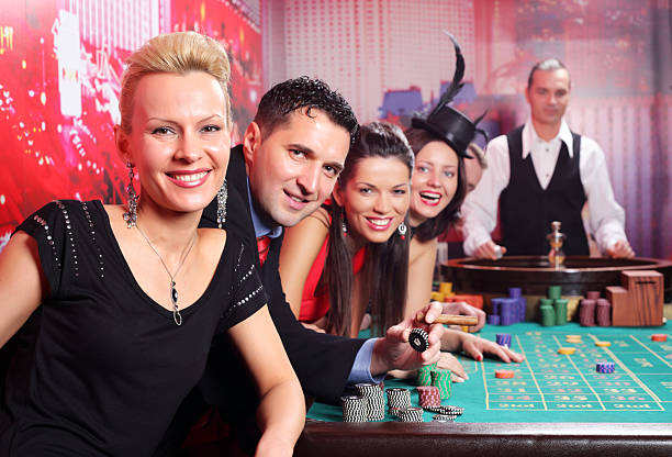 istock Group of casino gamblers on the roulette. 96151220