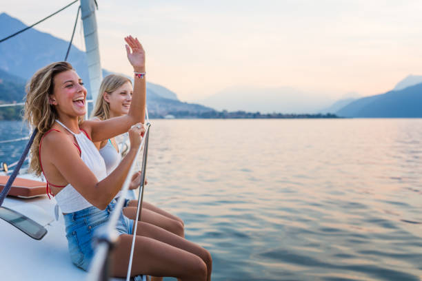 istock Two young women enjoy sailing trip 961515044