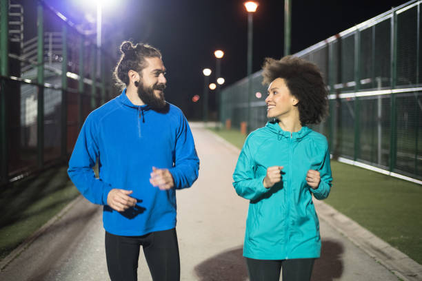 istock Fit joggers looking at each other 961516296