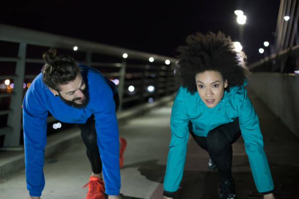 istock Fit young people on starting line 961516868