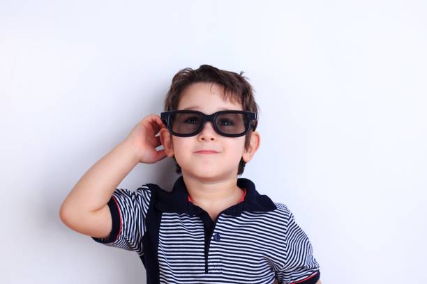 istock Happy lovely smiling boy in sunglasses, studio shoot on white. C 961517184