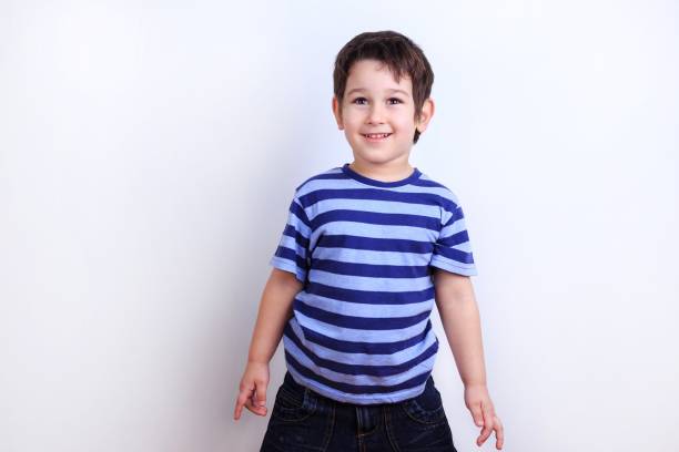istock Little lovely boy laughing, studio shoot on white. Emotions, fee 961519744