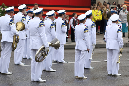 Pyatigorsk, Russia - May 9, 2018: Musicians of the Military Band in white uniform on parade to annual Victory Day on May 9
