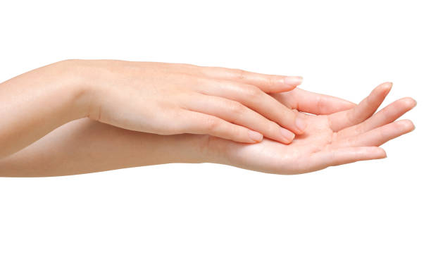 istock Beautiful women hands isolate, applying cream, massaging 961524758